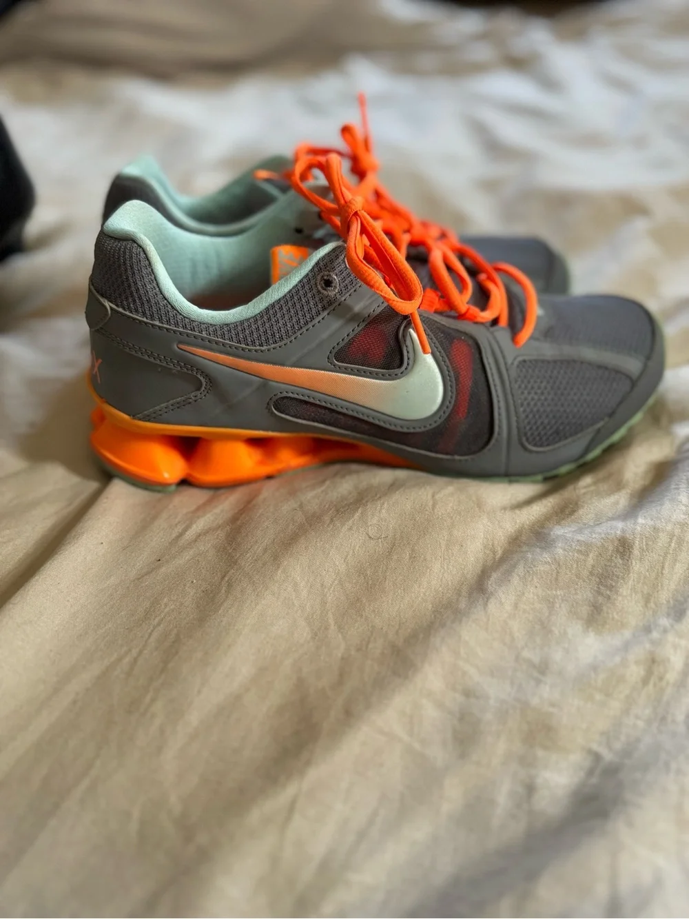 Nike Reax Run 8 Gray Sneakers with Bright Orange Laces and Mint Accents